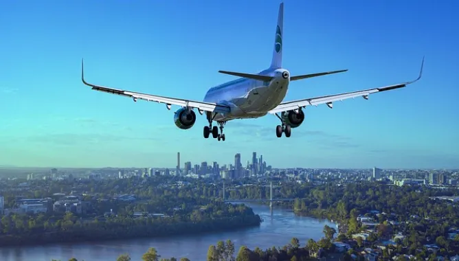 airplane, flight, city, landing, river, boeing, nature, aircraft, plane, travel, flying, sky, passenger aircraft, airliner, aviation, arrival, transport, skyscrapers, urban