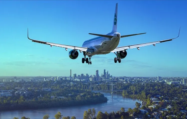 airplane, flight, city, landing, river, boeing, nature, aircraft, plane, travel, flying, sky, passenger aircraft, airliner, aviation, arrival, transport, skyscrapers, urban